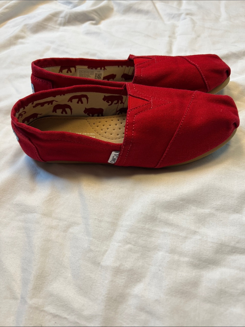 TOMS Women’s Red Canvas Slip-On Sneakers